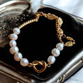 Bracelet Perles d'Eau Douce Nœud Doré